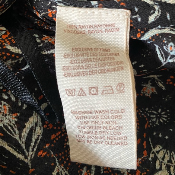 FREE PEOPLE Uptown Floral Black Bell Sleeve Top Size Medium - Picture 9 of 9